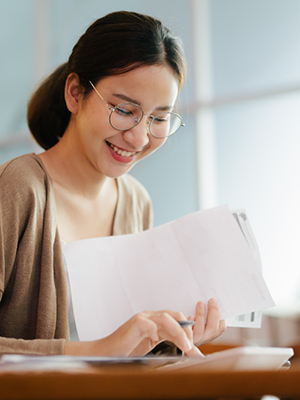 woman looking at some papers