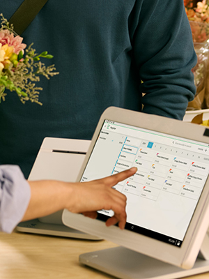 hand touching a computer screen