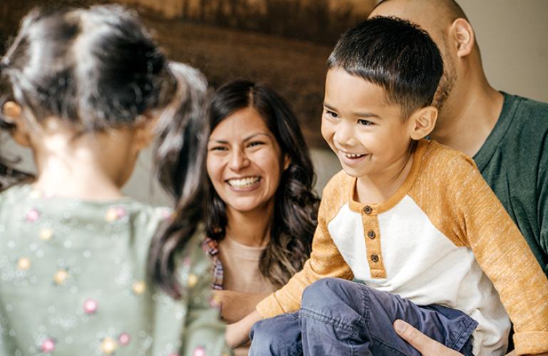 picture of a family laughing