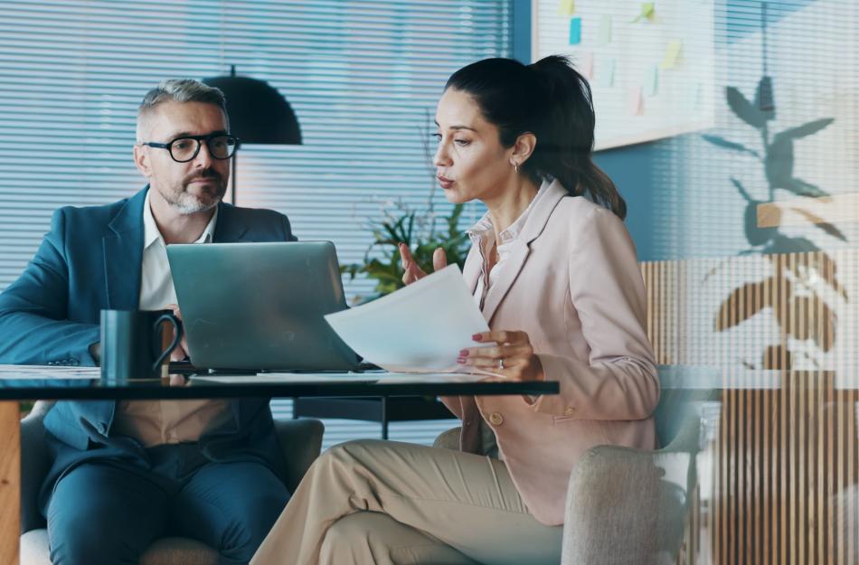 Man and woman at a desk