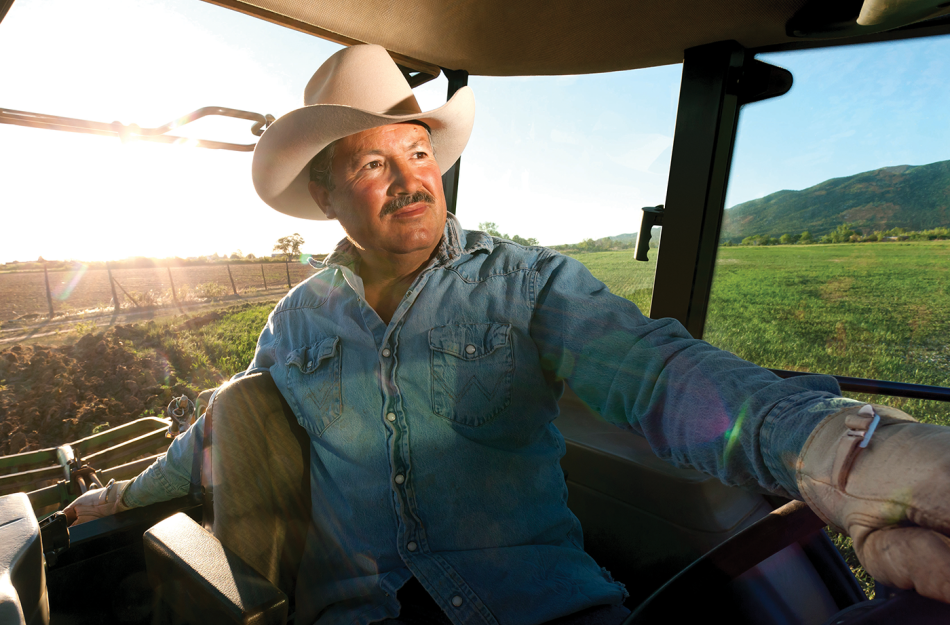 MAN DRIVING FARM MACHINERY